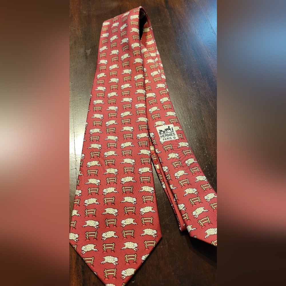 HERMES TIE SHEEP JUMPING FENCED